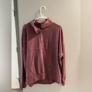 Never worn purple quarter button sweatshirt. With middle pocket